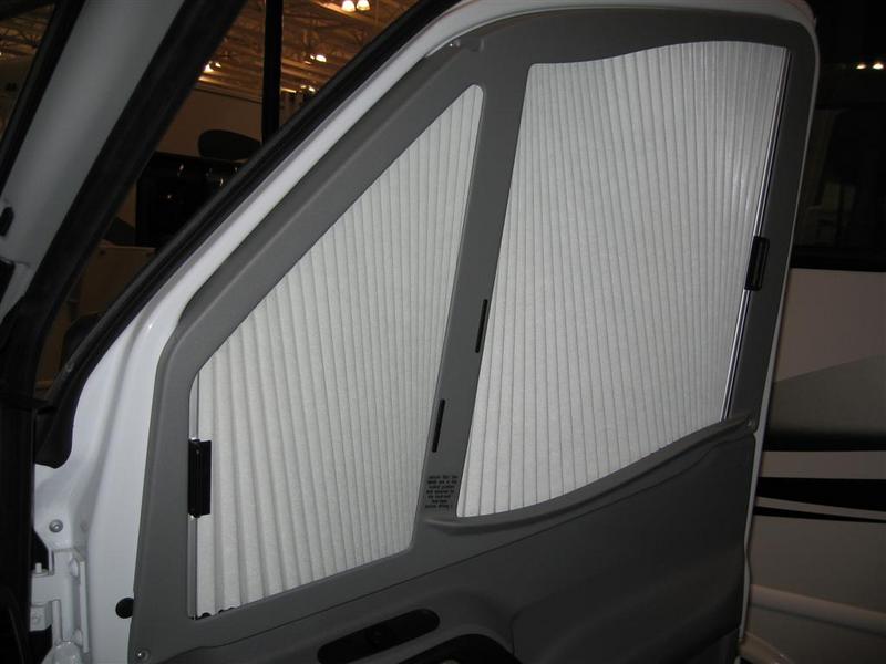 Side window blind found on the 2008 Itasca Navion, shown in closed position